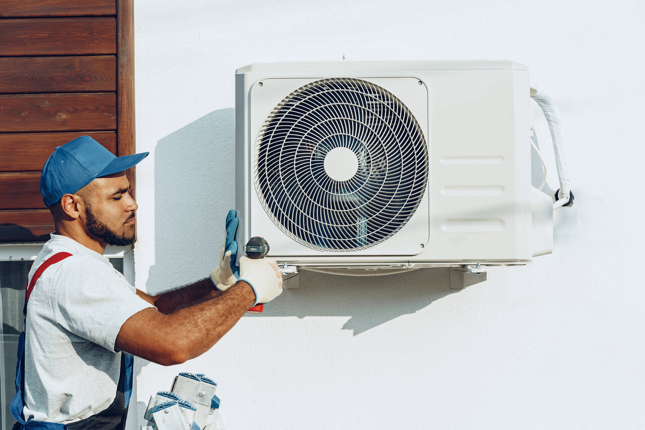 rsz repairman in uniform installing the outside unit o 2023 11 27 05 35 41 utc